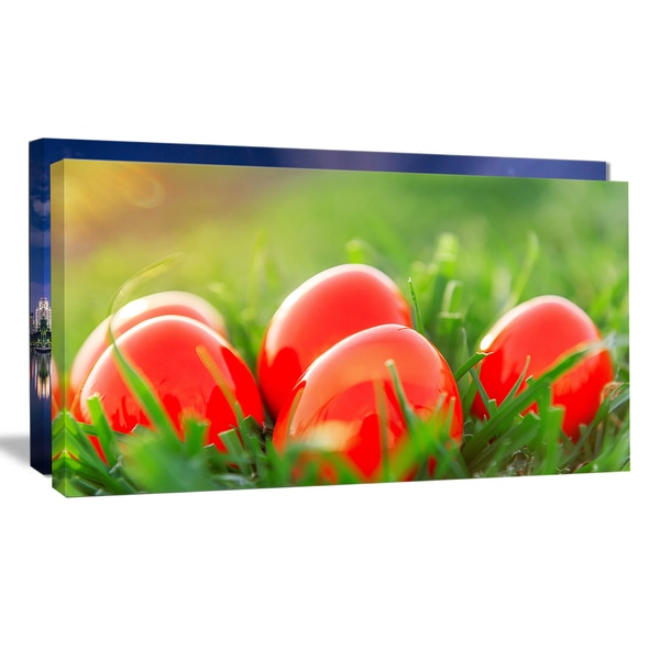 Red Easter Eggs in Green Grass - Landscape Photo Canvas Print